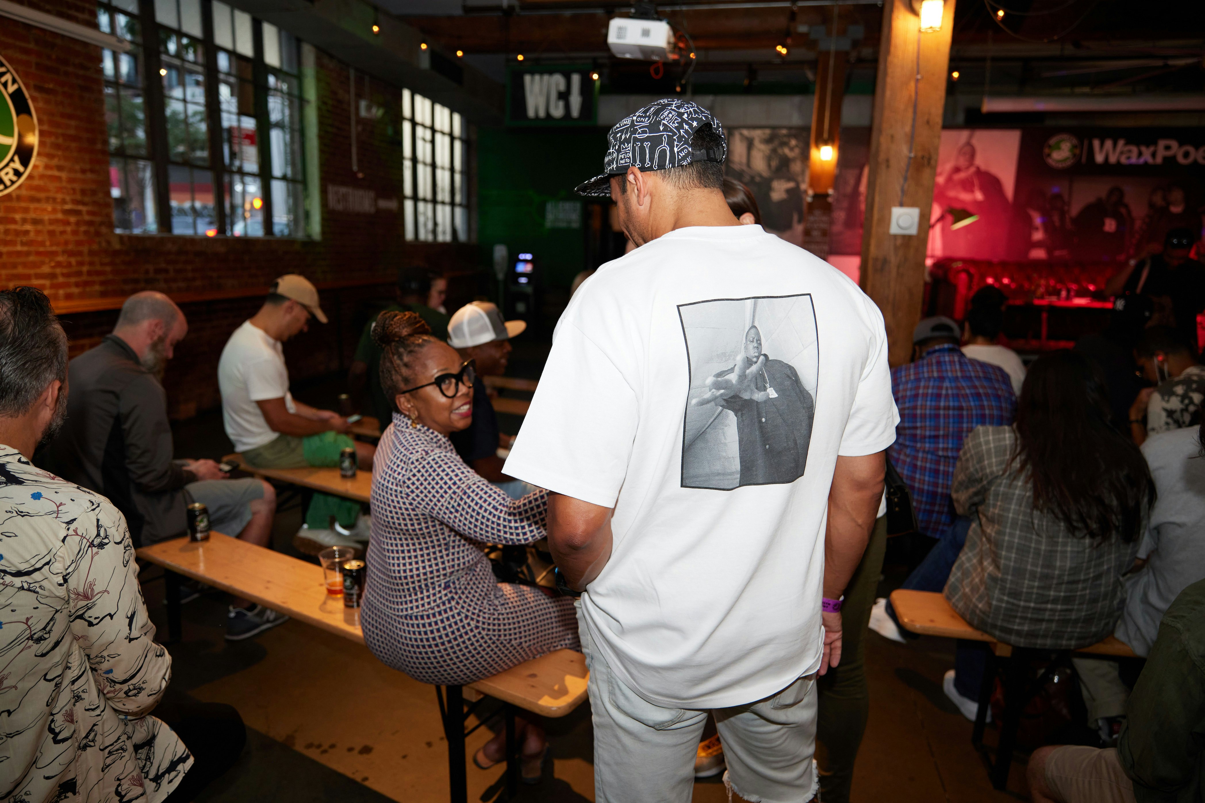 Sporting the The Notorious B.I.G. x Brooklyn Lager merch. Photo by Chris Caro/CMNN CNTRL.